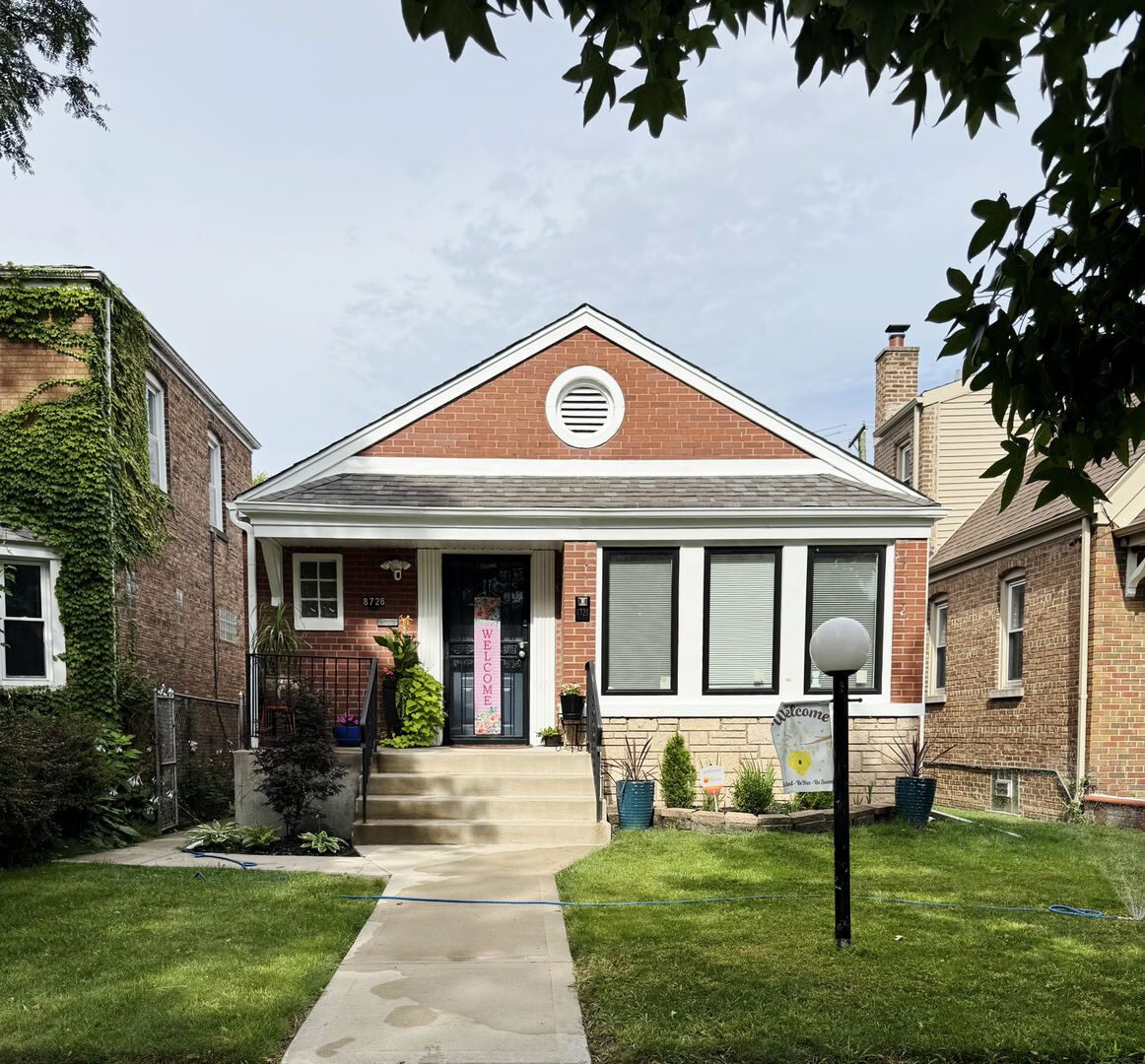 Property Photo: 8728 S Merrill Avenue IL 60617