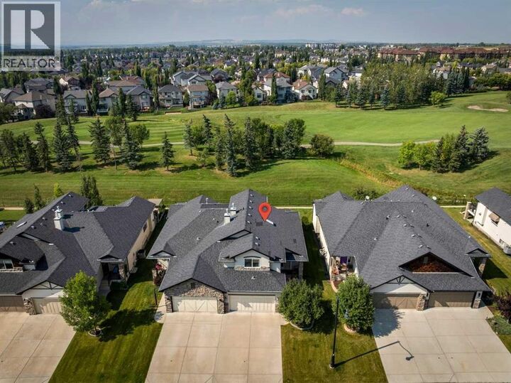Property Photo: 307 Crystal Green Rise AB T1S 2N5