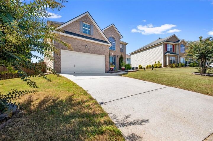 Property Photo:  1027 Winding Woods Trail  GA 30012 