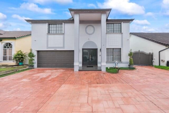 Property Photo: 18811 NW 80th Ave FL 33015