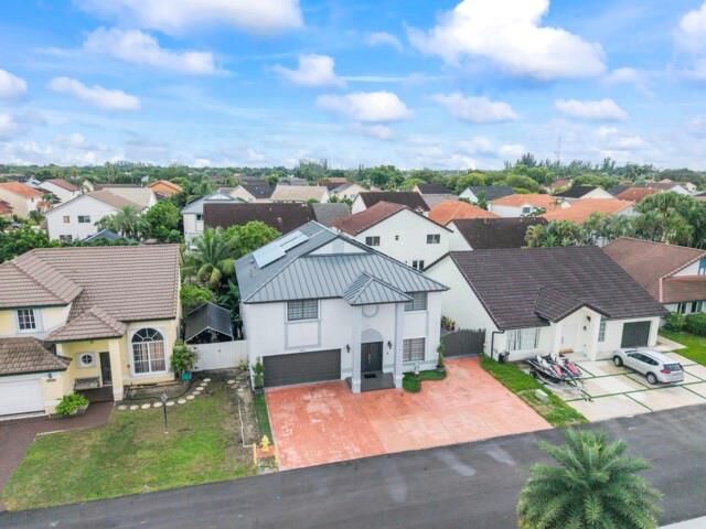 Property Photo: 18811 NW 80th Ave FL 33015
