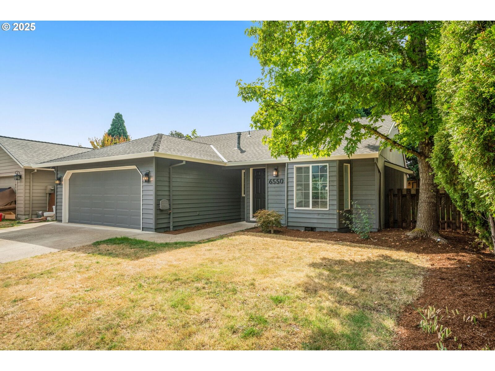 Property Photo:  6550 SE Wrenfield St  OR 97123