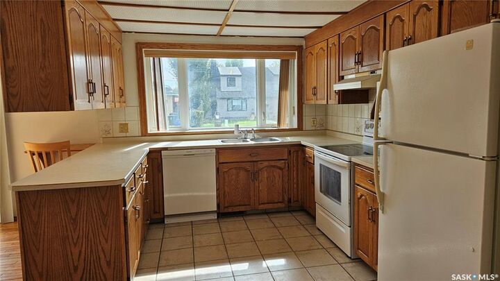 Property Photo:  205 1st Street W  SK S0K 2L0 