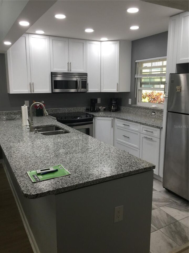 Property Photo: 10215 Regal Drive 14 FL 33774