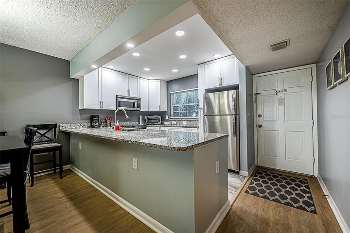 Property Photo: 10215 Regal Drive 14 FL 33774