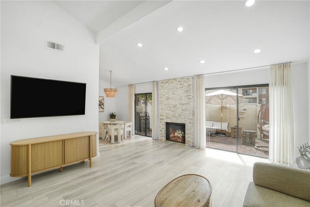 Property Photo:  21551 Burbank 120  CA 91367 