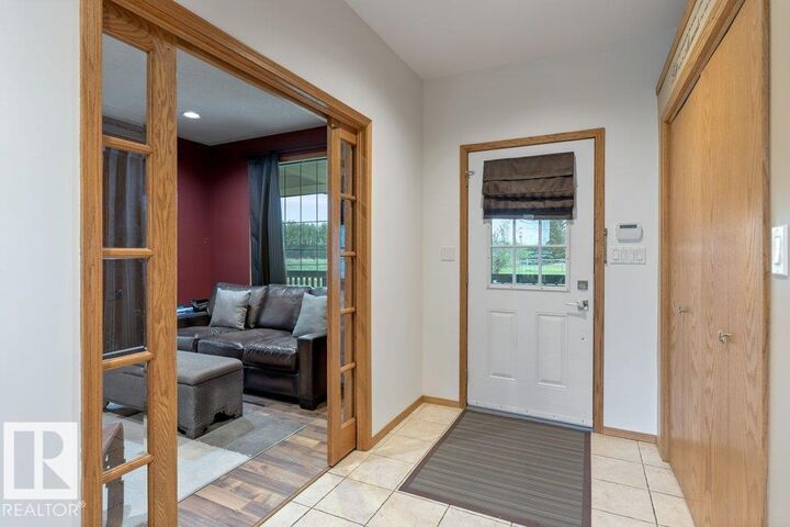Property Photo:  10911A Atim Road  AB T7X 6L9 