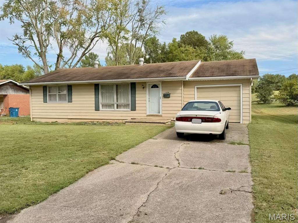 Property Photo:  1306 1st Street  MO 63780 