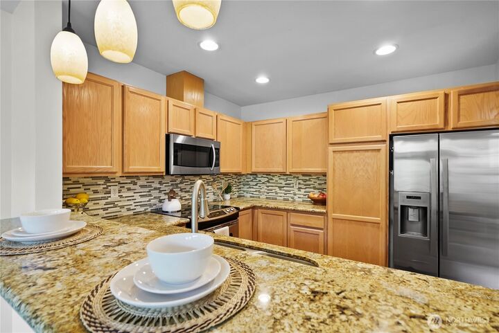 Property Photo:  14714  53rd Avenue W 116  WA 98026 