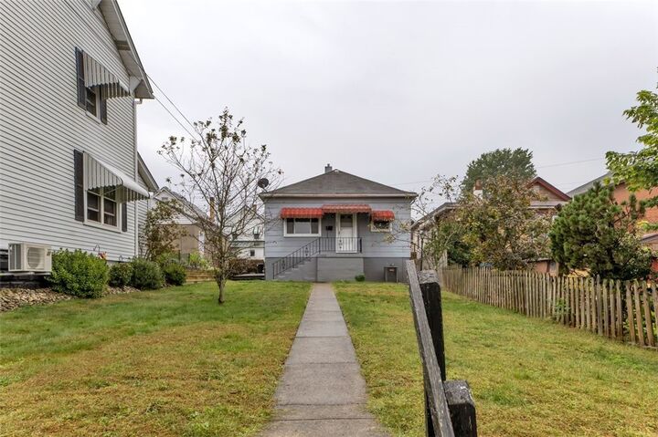 Property Photo:  323 Sycamore Street  PA 15690 