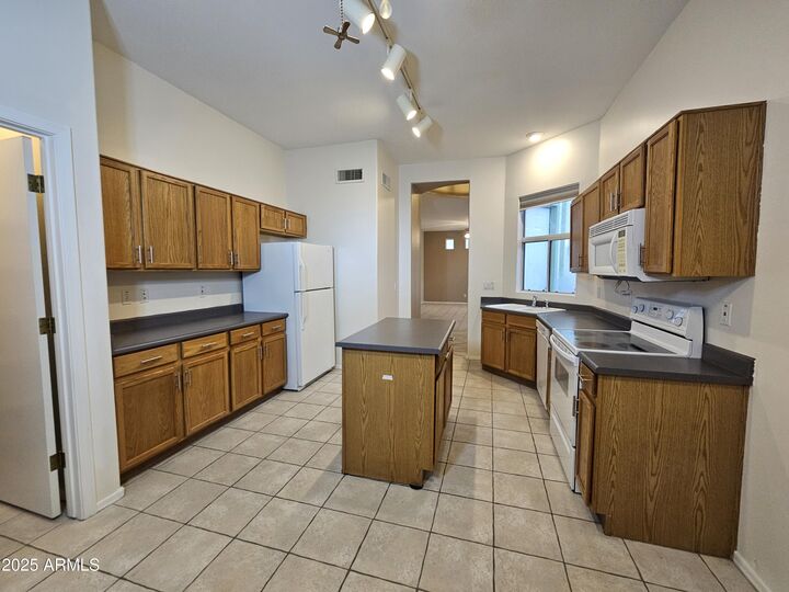 Property Photo: 9718 W Purdue Avenue AZ 85345