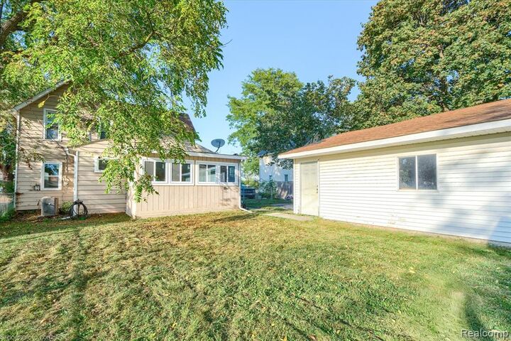 Property Photo: 323 Turrill Avenue MI 48446 2542