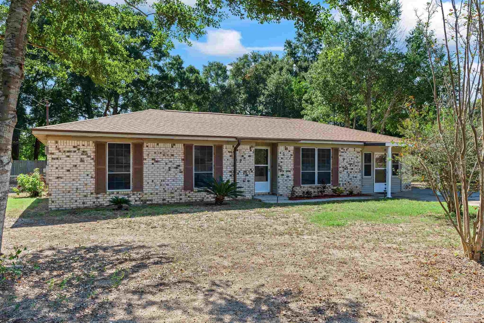 Property Photo:  5485 Mulat Rd  FL 32583 