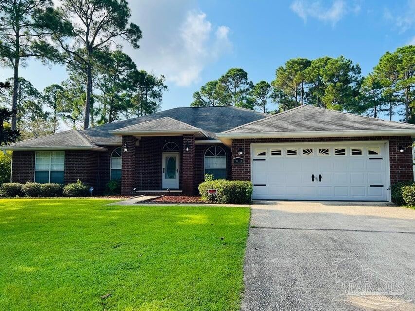 Property Photo:  7013 Leisure St  FL 32566 