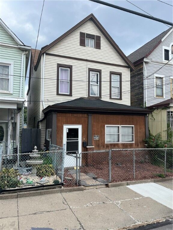 Property Photo:  213 Comrie Ave  PA 15104 