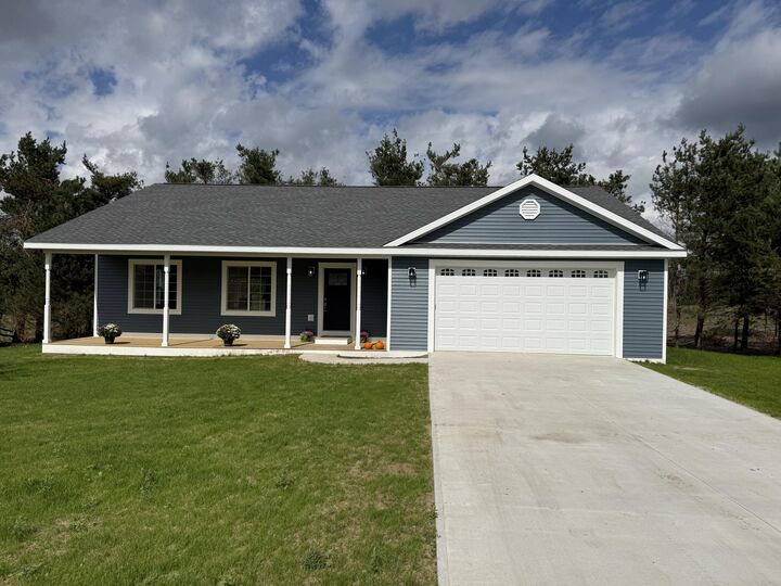 Property Photo: 374 Goshawk Circle MI 49735