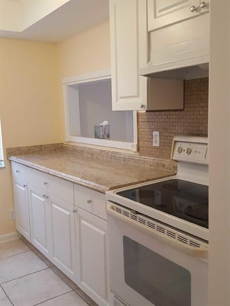 Property Photo: 104 SE 10th St 101 FL 33441