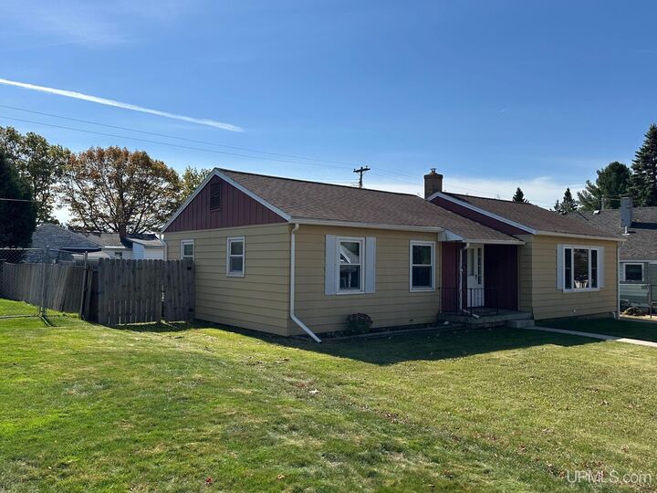 Property Photo:  706 Duncan Avenue  MI 49849-0000 