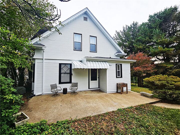 Property Photo:  10361 Washington Ave  PA 15642 