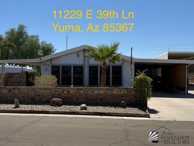 Property Photo: 11229 E 39 Ln AZ 85367