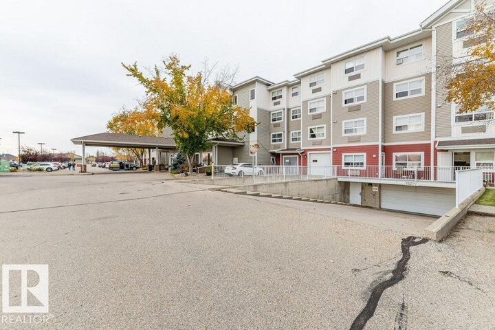 Property Photo: 8802 Southfort Drive 214 AB T8L 4R6