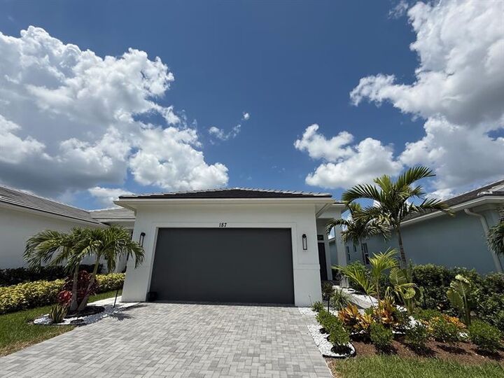 Property Photo:  187 SE Via Sangro  FL 34952