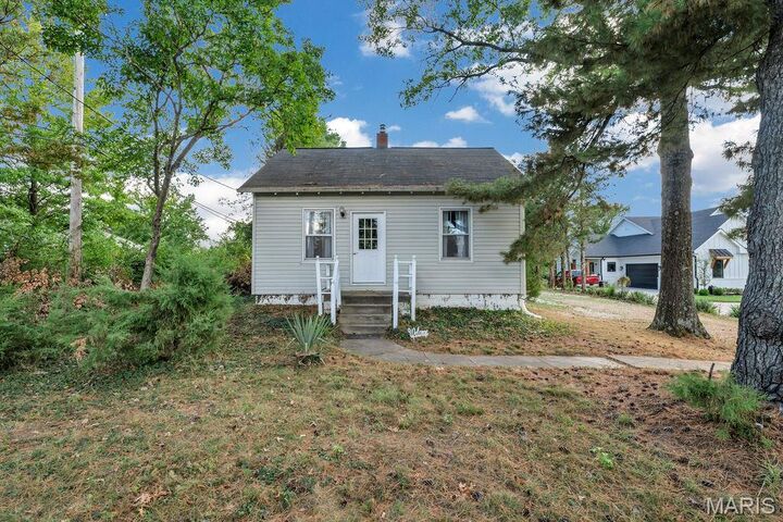 Property Photo:  12204 Ladue Road  MO 63141 