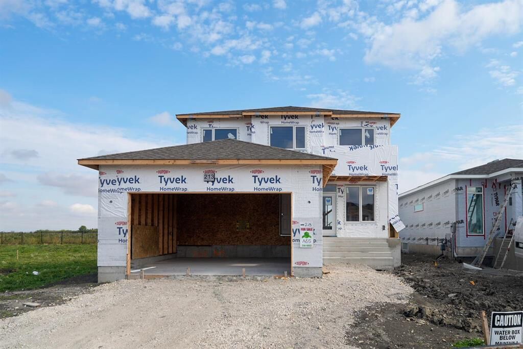 Property Photo:  213 Woodland Way  MB R4A 0E7 
