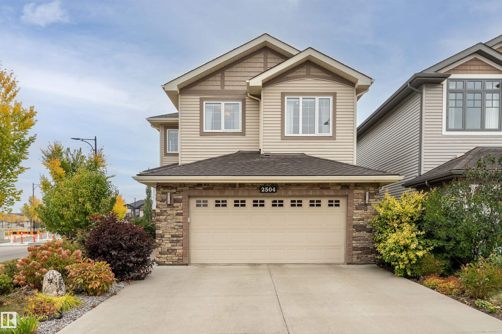 Property Photo: 2504 Amerongen Crescent SW AB T6W 3C2