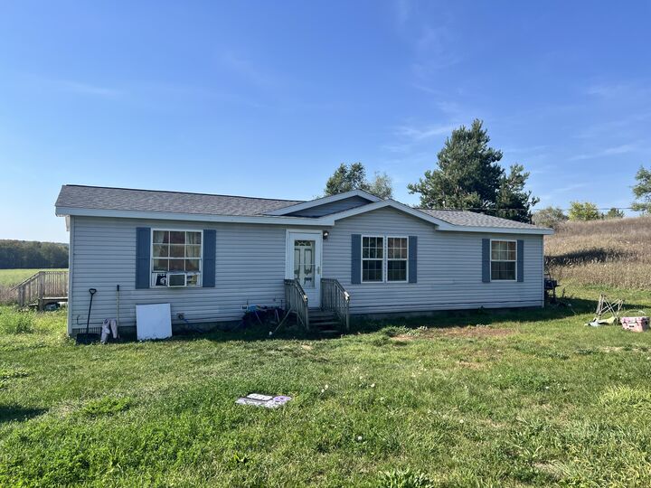 Property Photo: 4897 S 64th Avenue MI 49446