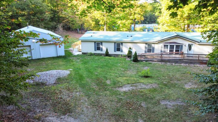 Property Photo:  8117 W 12 Mile Road  MI 49309 