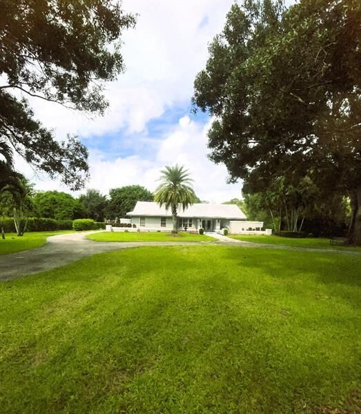 Property Photo:  14183 Greentree Trl  FL 33414 