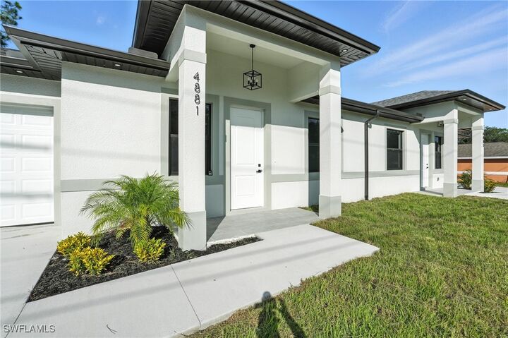 Property Photo: 4881/4883 Leonard Boulevard S FL 33973