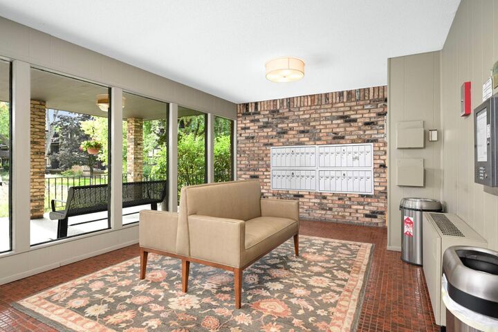 Property Photo:  205 Barry Avenue S 305  MN 55391 