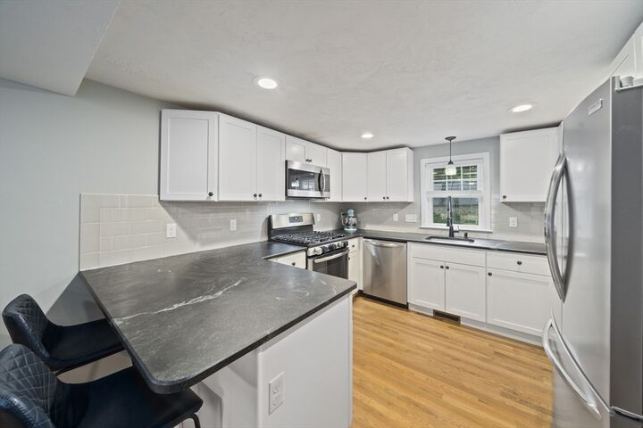 Property Photo:  54 Elmlawn Rd  MA 02184 