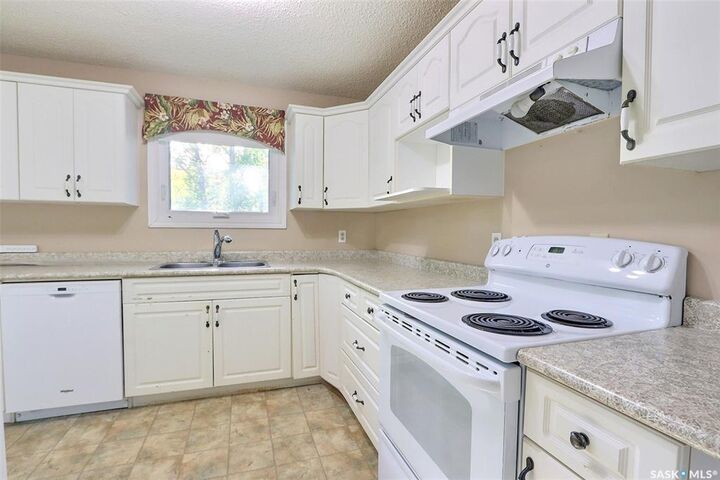 Property Photo:  165 Macdowall Crescent  SK S6V 6N4 
