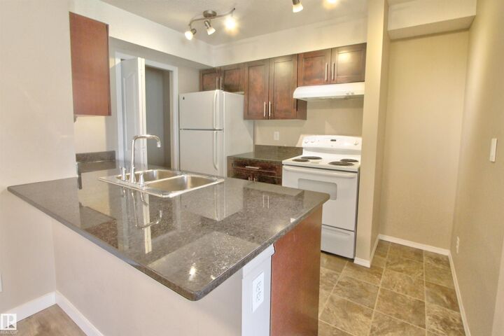 Property Photo: 530 Watt Boulevard SW 106 AB T6X 1P7