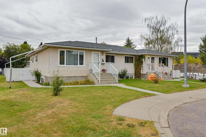 Property Photo: 9404 9406 Holyrood Road NW AB T6C 4H4