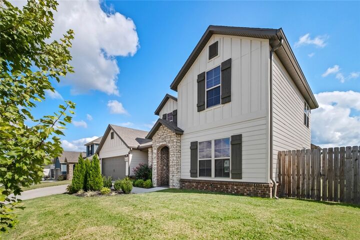 Property Photo:  208 Wilson Boulevard  AR 72751 