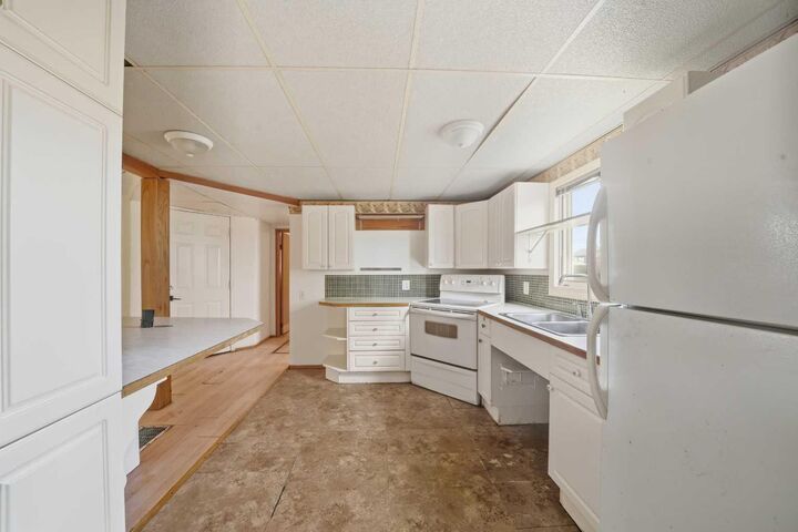 Property Photo:  1221 Lucina Street  AB T0M 1R0 