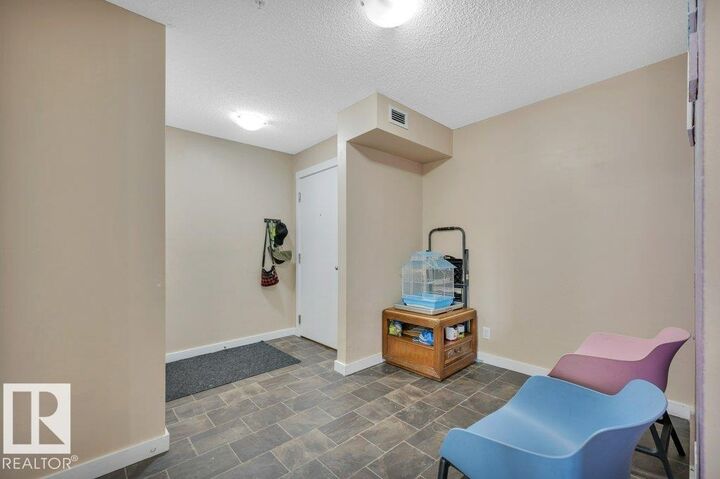 Property Photo: 111 Watt Common SW 201 AB T6X 2C6
