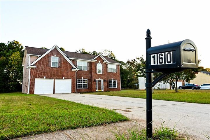 Property Photo: 160 Leyland Cypress Way GA 30294