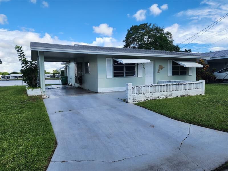 Property Photo: 2409 NW 51st St FL 33309