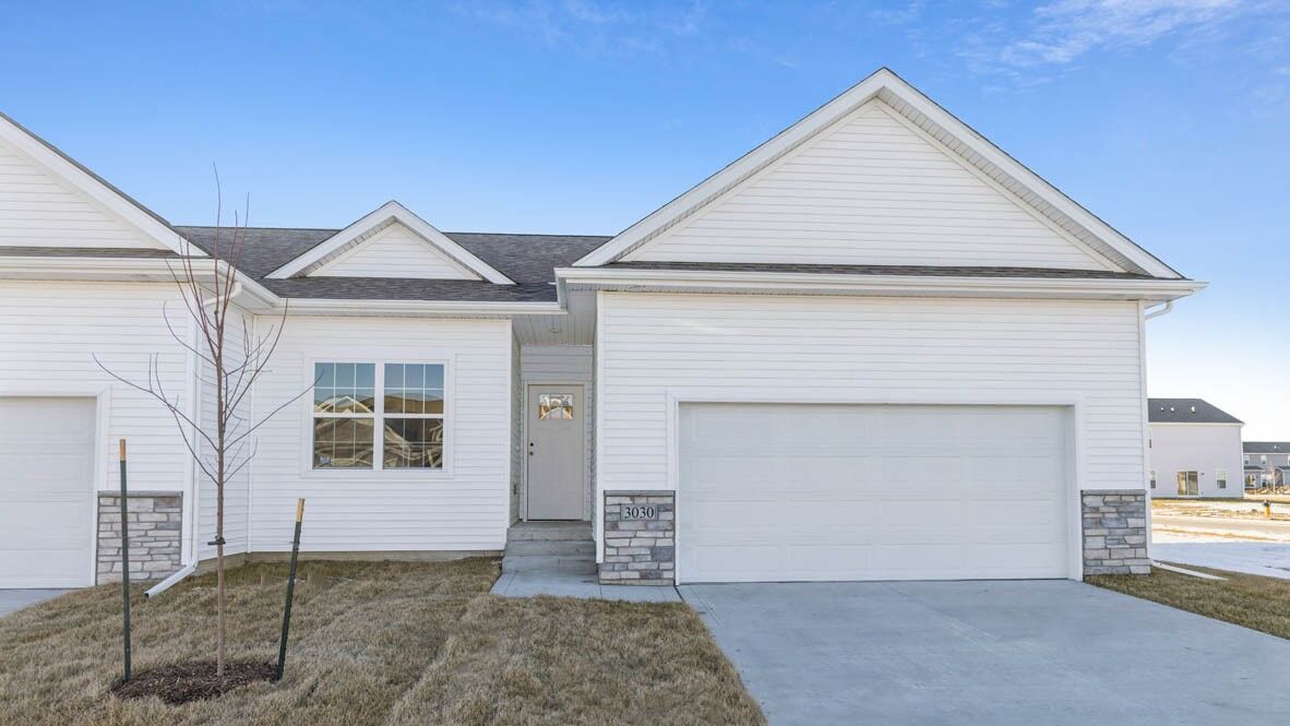 Property Photo: 701 Maddie Lane IA 52340