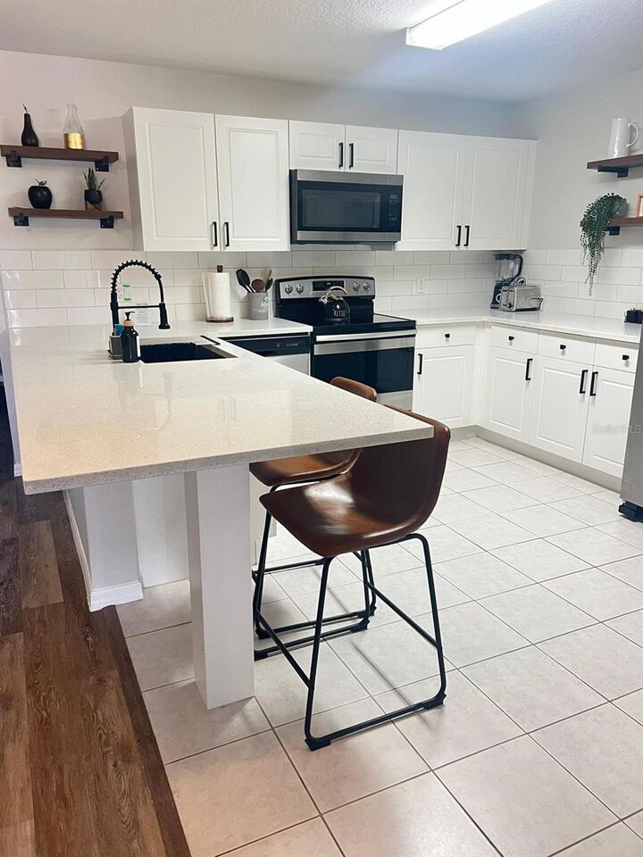 Property Photo: 8837 Grand Palms Circle A FL 34747