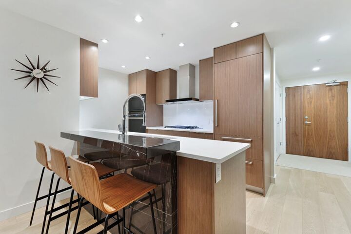 Property Photo: 128 Waterfront Court SW 104 AB T2P 1K9