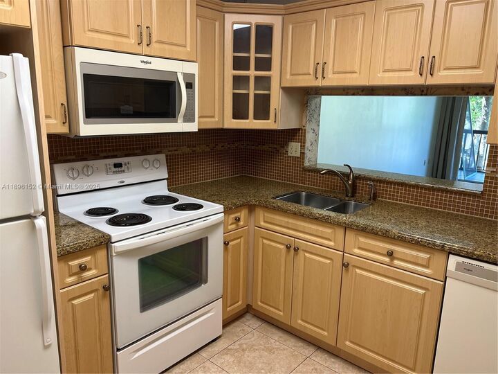 Property Photo: 10855 SW 112th Ave 215 FL 33176