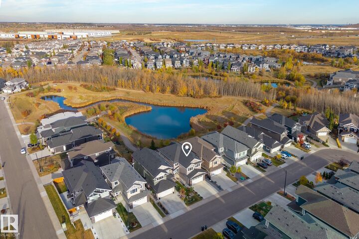 Property Photo: 3419 Chickadee Drive NW AB T5A 0L1