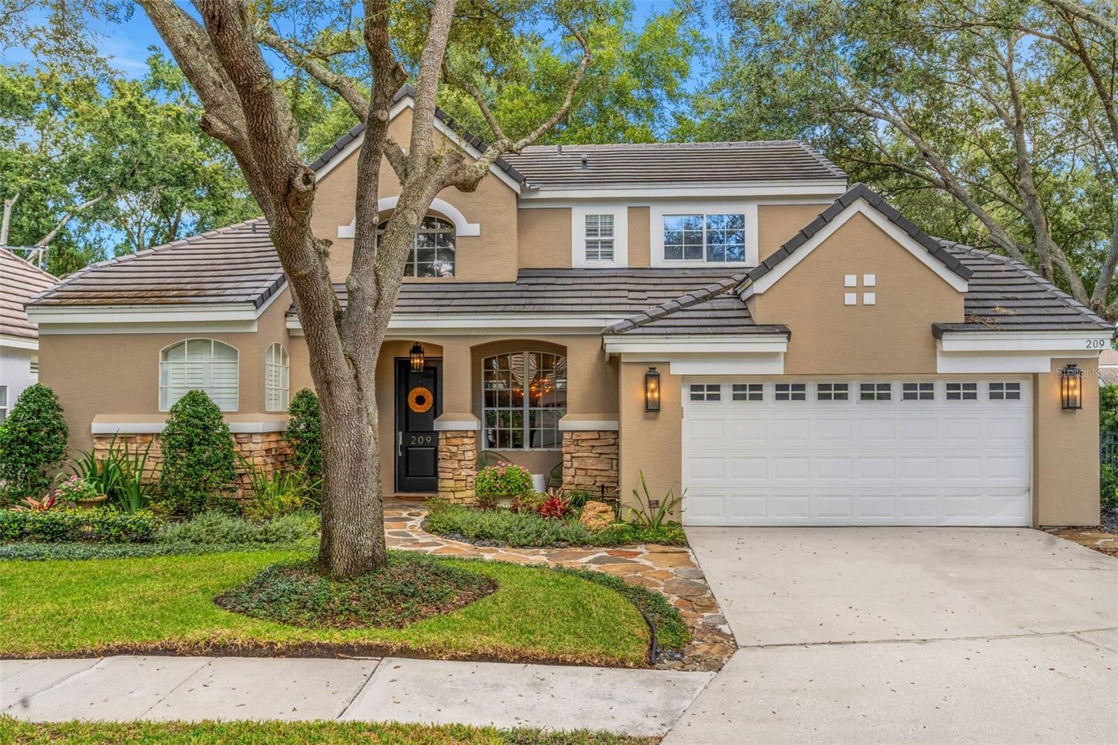 Property Photo: 209 Wimbledon Circle FL 32746