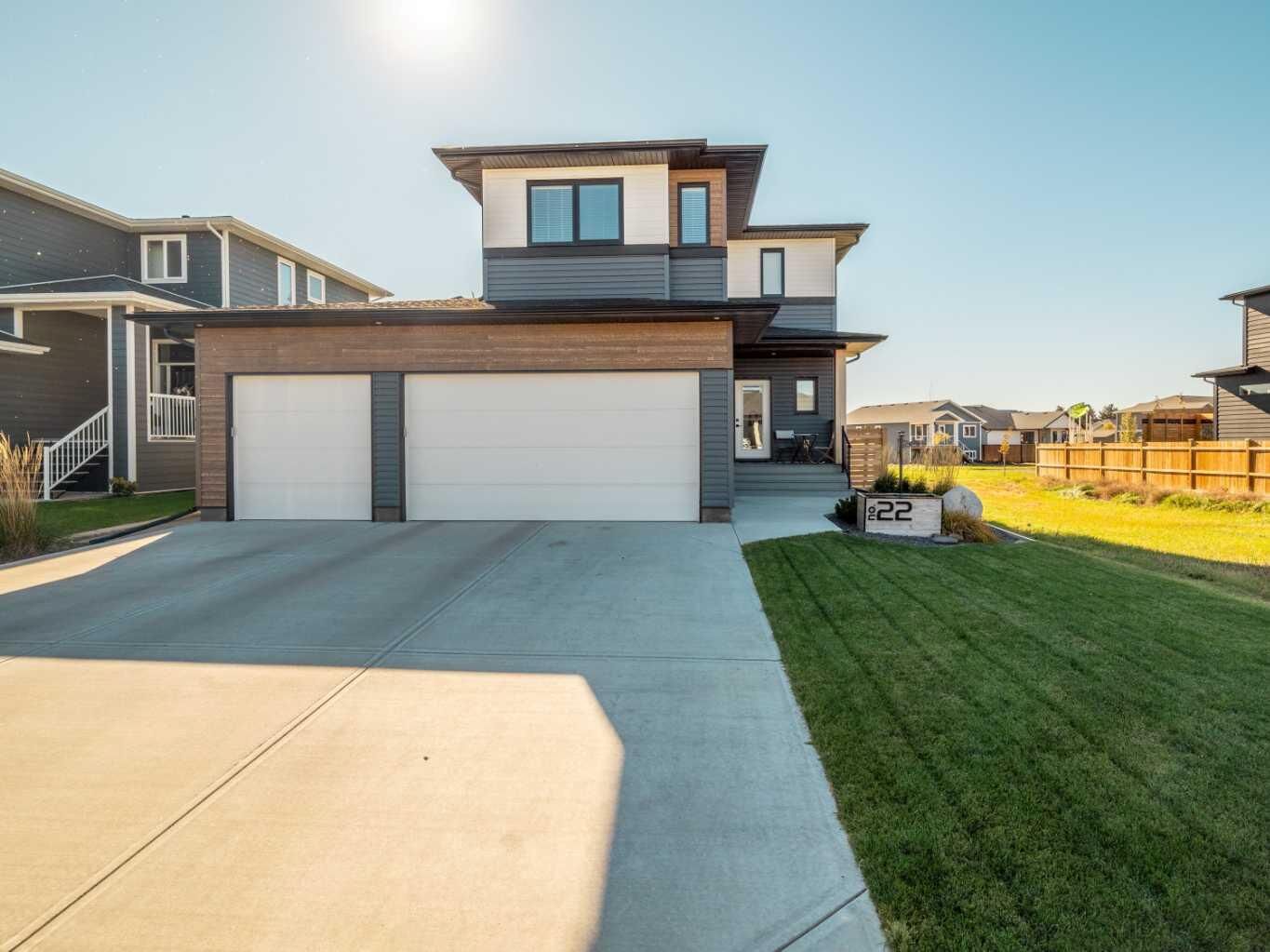 Property Photo: 22 Prairie Sunset Ave AB T1G 0E7